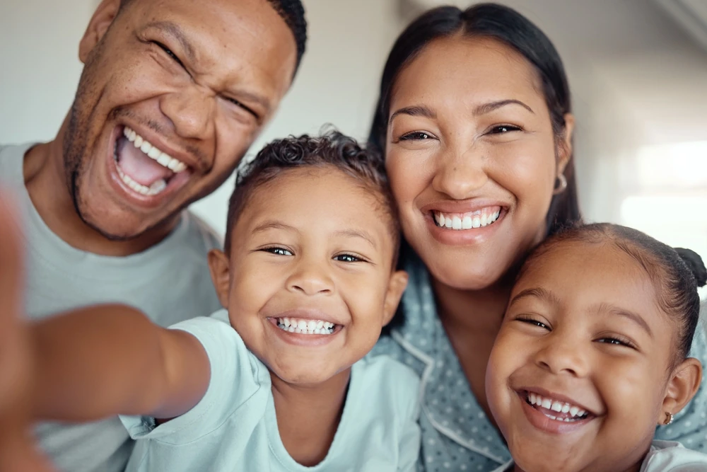 Smiling family enjoying whole-body wellness